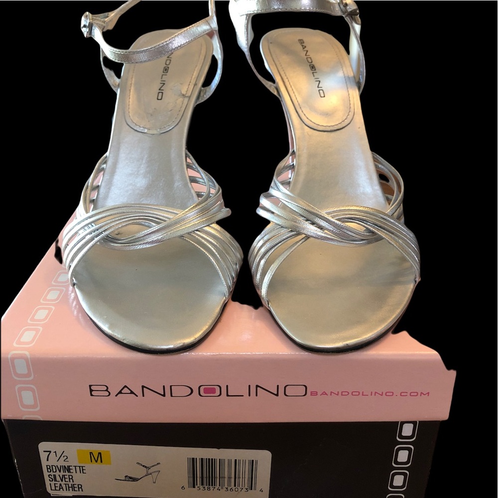 Like new. Bandolino Size 7.5 leather silver strappy sandal.